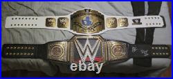 Autographed WWE World Championship belt & WWE Intercontinental Championship